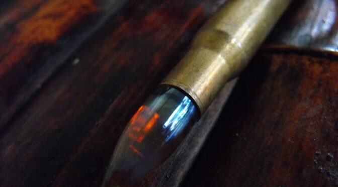 Handcrafted Glass Bullet – Real Shell Casing – 2/2 – 30 -O6 – Amber
